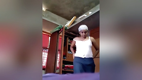 Sexy brunette is showing off her body for us today