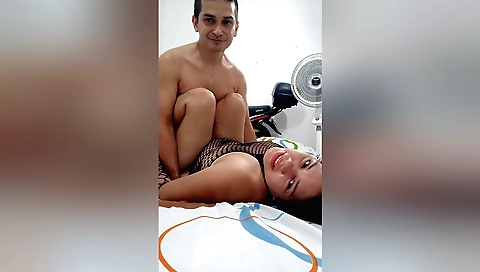 Indian woman with big tits is dancing in a bedroom