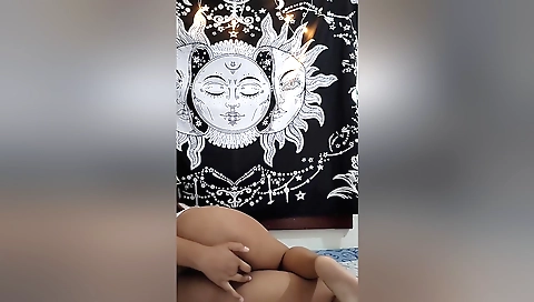 Cute brunette with natural boobs doing something on cam