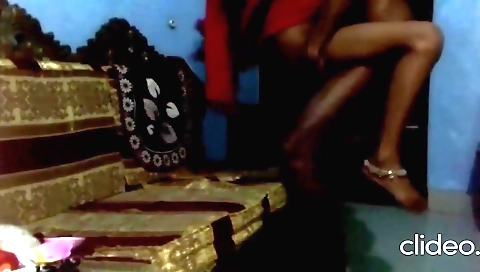 A brunette milf in a sexy dress is getting fucked on cam