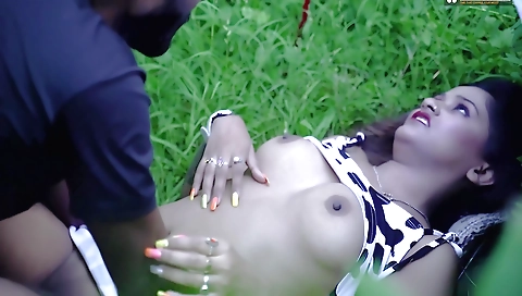 Curvy brunette with a sexy face gets naked outdoors