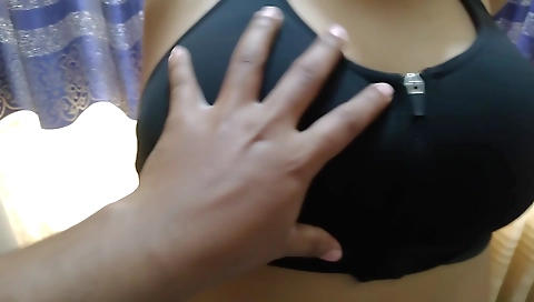 Brunette brunette with big tits in red dress in webcam video