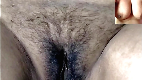 Indian hairy girl is with her hands and fingers on her pussy