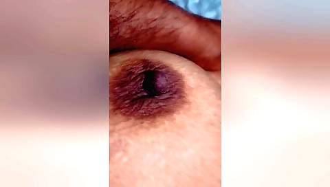 Sexy indian teen with a cute face is playing with a dildo