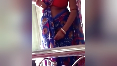 Amateur solo female in a red dress with large natural tits