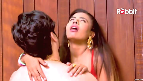 A brunette in sexy lingerie gets her pussy fucked outdoors