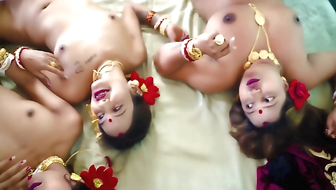 Indian brunette fucks with four wives in a hot group porn video