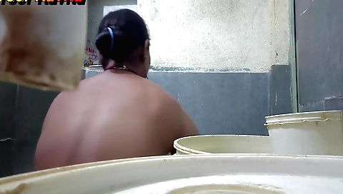 Indian brunette stepsister-in-law masturbates in the bathroom