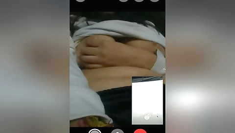 Indian brunette is naked in her bedroom in the camera video