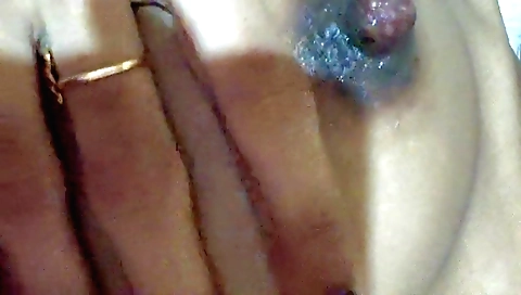 Hot solo female masturbating in bed with her own pussy