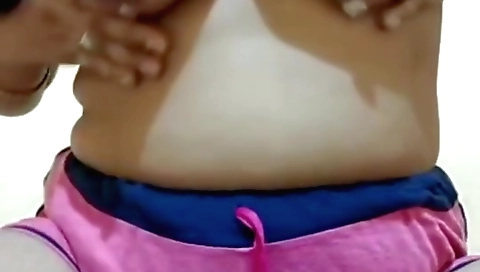 Sexy brunette teen is showing off her boobs on webcam