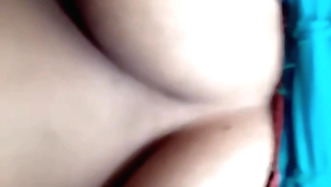 Sexy brunette in a sexy dress and bra in amateur solo video