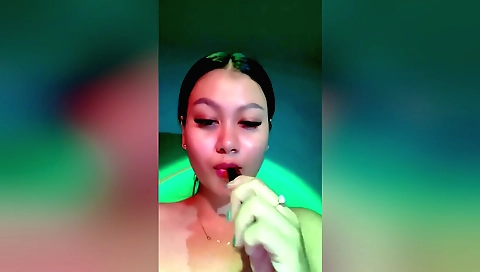 Horny brunette with a thin body masturbates in the shower