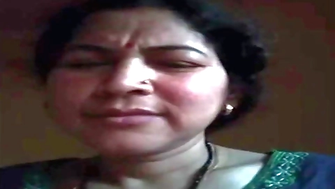 Busty brunette gets fucked in her hairy pussy in a cam vid