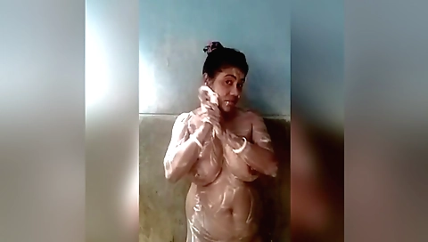 Busty brunette chick fingers and toys her tight booty