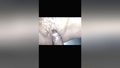 Amateur brunette milf gets her hairy pussy fingered