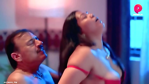 A sexy brunette milf in lingerie is getting off in the camera