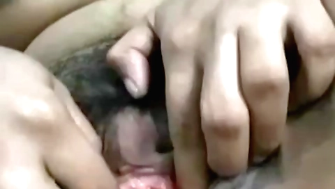 Indian brunette masturbating in solo video on web cam