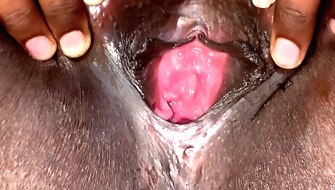 Indian woman in white tights and her husband in a red dress